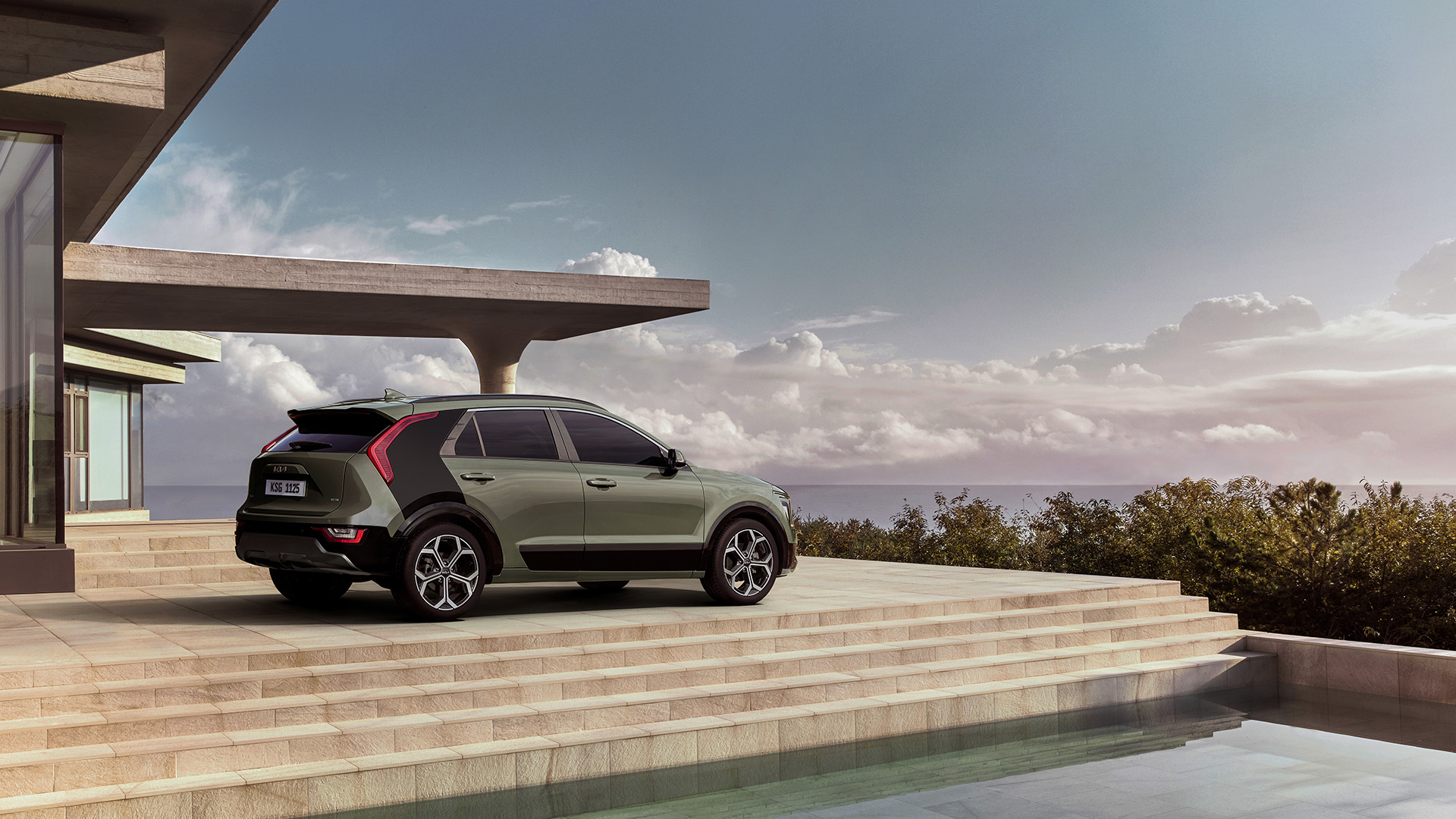 Rear view of the Niro parked on a staircase made of woods