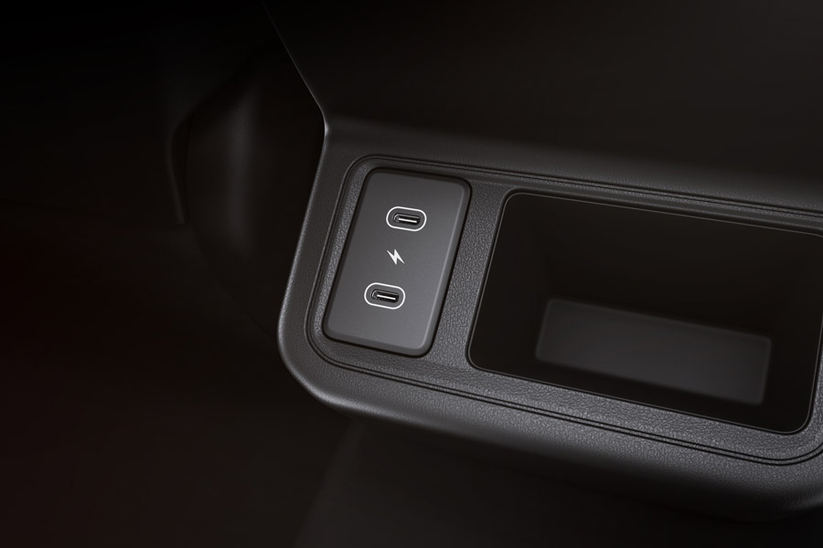 Rear seat USB port and storage tray