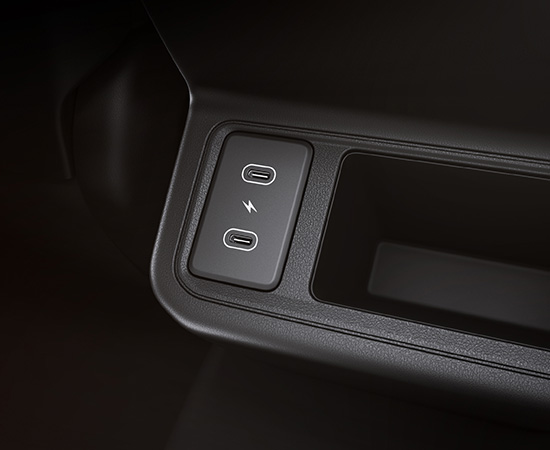 Rear seat USB port and storage tray